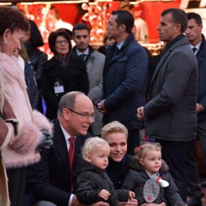 Semi-exclusif - Le prince Albert II de Monaco, son épouse la princesse Charlene et leurs enfants le prince Jacques et la princesse Gabriella pendant l'inauguration du Village de Noël à Monaco le 3 décembre 2016. Le Village de Noël est installé sur le quai Albert 1er du Port Hercule. Les animations telles que manèges pour enfants, la patinoire ou la grande roue et les différents stands de souvenirs ou de nourritures seront ouverts du 2 décembre au 2 janvier 2017. © Charly Gallo / Gouvernement Princier /Pool restreint Monaco/Bestimage Semi-exclusive