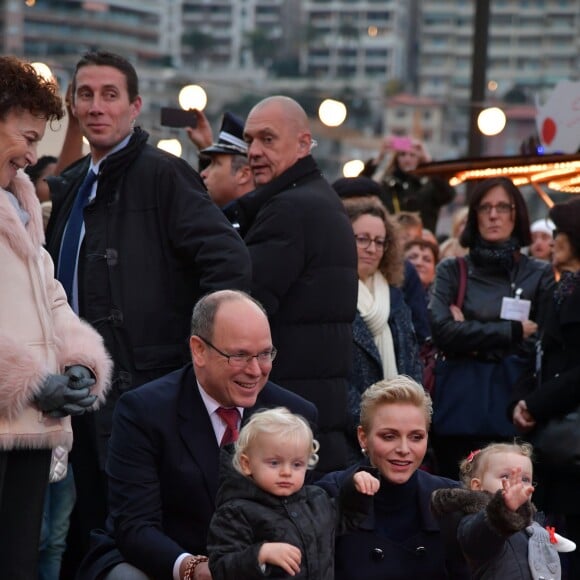 Semi-exclusif - Le prince Albert II de Monaco, son épouse la princesse Charlene et leurs enfants le prince Jacques et la princesse Gabriella pendant l'inauguration du Village de Noël à Monaco le 3 décembre 2016. Le Village de Noël est installé sur le quai Albert 1er du Port Hercule. Les animations telles que manèges pour enfants, la patinoire ou la grande roue et les différents stands de souvenirs ou de nourritures seront ouverts du 2 décembre au 2 janvier 2017. © Charly Gallo / Gouvernement Princier /Pool restreint Monaco/Bestimage Semi-exclusive