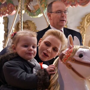 Semi-exclusif - Le prince Albert II de Monaco, son épouse la princesse Charlene et leur fille Gabriella pendant l'inauguration du Village de Noël à Monaco le 3 décembre 2016. Le Village de Noël est installé sur le quai Albert 1er du Port Hercule. Les animations telles que manèges pour enfants, la patinoire ou la grande roue et les différents stands de souvenirs ou de nourritures seront ouverts du 2 décembre au 2 janvier 2017. © Charly Gallo / Gouvernement Princier /Pool restreint Monaco/Bestimage Semi-exclusive