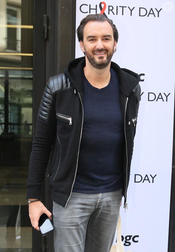 Cyril Lignac - 11ème édition du "BGC Charity Day" à Paris le 11 septembre 2015 en mémoire aux 658 collaborateurs du groupe BGC partners (leader mondial du courtage interbancaire) disparus il y a 14 ans dans les attentats du World Trade Center le 11 septembre 2001. Les people sont courtier d'un jour pour encourager les clients à passer ce jour là le maximum d'ordres dans la salle des marchés d'Aurel BGC au 62, rue de Richelieu 75002 Paris. Chaque 11 septembre , la totalité du chiffre d'affaire réalisé par le groupe sera reversée à des associations.