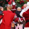 Gabriella et Jacques à la rencontre du père Noël. Le prince Albert II et la princesse Charlene de Monaco procédaient le 14 décembre 2016 à la traditionnelle distribution de cadeaux de Noël aux écoliers de la principauté, en présence de leurs enfants le prince Jacques et la princesse Gabriella (laquelle a vite déserté, piquant une colère), et secondés par Louis Ducruet et Camille Gottlieb, enfants de la princesse Stéphanie. © Dominique Jacovides / Bestimage