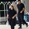 Blac Chyna, enceinte, et son fiancé Rob Kardashian quittent leur hôtel de Miami le 18 mai 2016.