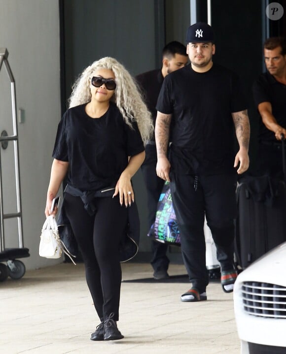 Blac Chyna, enceinte, et son fiancé Rob Kardashian quittent leur hôtel de Miami le 18 mai 2016.