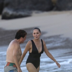 Exclusif - Sharon Stone et son nouveau compagnon Lonnie Cooper (un agent sportif) se baignent sur une plage de Saint-Barthélemy le 29 novembre 2016.