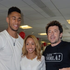 Tony Yoka, sa compagne Estelle Mossely et Patrick Bruel - 12ème édition du "BGC Charity Day" à Paris, le 12 septembre 2016.