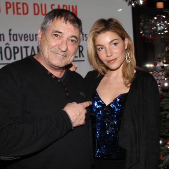 Exclusif - Jean-Marie Bigard et sa femme Lola Marois lors de la soirée en faveur des enfants de l'hôpital Necker (1 cadeau par personne à déposer au pied du sapin: Jouets, livres, CD, BD, jeux vidéos,montres, vêtements ... Sans papier cadeau) organisé par Hervé Taïeb, Philippe Lavil, Franck Couécou, Jean-Roch et Moët & Chandon au restaurant La Gioia VIP Room theater à Paris, France, le mardi 20 décembre 2016. © Baldini/Bestimage