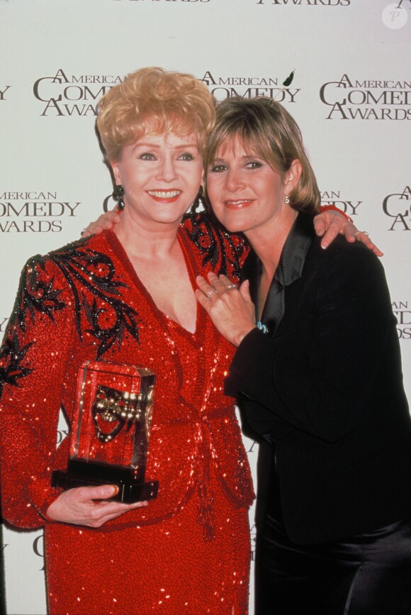 Carrie Fisher et sa mère Debbie Reynolds à la 11ème soirée des "American Comedy Awards" (1997)