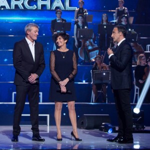 Exclusif - Laurence et Pierre Lemarchal, parents de Grégory, avec leur ami Nikos Aliagas lors de la soirée hommage Grégory Lemarchal : Dix ans après, l'histoire continue, le 7 janvier 2017 au Zénith de Paris et sur TF1 (réalisation DMLS TV), au profit de la construction d'une maison d'accueil pour les patients atteints de la mucoviscidose. © Cyril Moreau/Bestimage