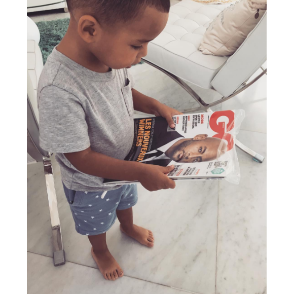 Booba partage une photo de son fils Omar, tenant une couverture de lui pour "GQ". Décembre 2016.