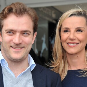 Laurence Ferrari et son mari Renaud Capuçon posant au village des Internationaux de France de tennis de Roland Garros à Paris, le 3 juin 2014.