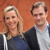 Laurence Ferrari et son mari Renaud Capuçon posant au village des Internationaux de France de tennis de Roland Garros à Paris, le 3 juin 2014.