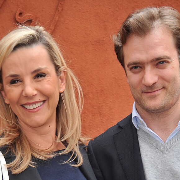 Laurence Ferrari et son mari Renaud Capuçon posant au village des Internationaux de France de tennis de Roland Garros à Paris, le 3 juin 2014.