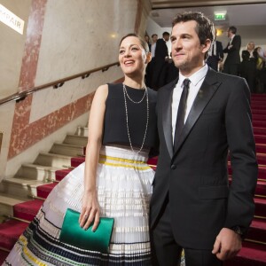 Guillaume Canet et sa compagne Marion Cotillard - 40e cérémonie des César au théâtre du Châtelet à Paris, le 20 février 2015.