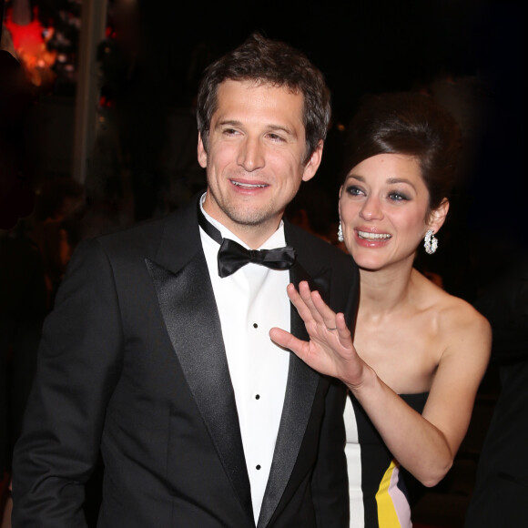 Guillaume Canet et sa compagne Marion Cotillard lors du 66e Festival du film de Cannes, le 20 mai 2013.