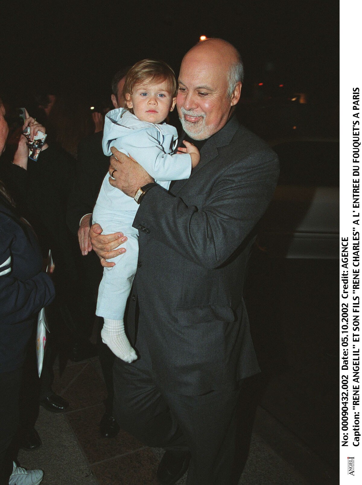 Photo : René-Charles et René Angélil à Paris, le 5 octobre 2002 ...