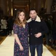 Alyson Paradis et son compagnon Guillaume Gouix assistent au défilé Bonpoint, collection automne-hiver 2017, à la Galerie de Minéralogie. Paris, le 25 janvier 2017.