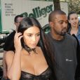Kim Kardashian et Kanye West arrivent chez Givenchy, à Paris, le 29 septembre 2016.