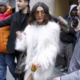 Vanessa Hudgens quitte les studios de NBC à New York, habillée d'un manteau en fausse fourrure Pam&amp;Gela, d'un pull blanc et d'une jupe By Johnny, d'un sac Balenciaga et de sandales Schutz. Le 30 janvier 2017.