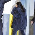 Kim Kardashian à New York, porte un manteau, un jogging en velours et des chaussures YEEZY (collection YEEZY Season 4). Le 31 janvier 2017.