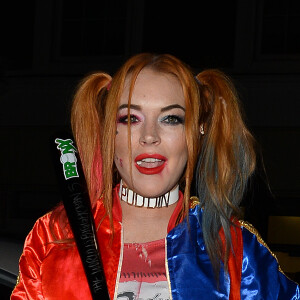 Lindsay Lohan (déguisée en Harley Quinn du film Suicid Squad) arrive à une fête d'Halloween à Londres, le 31 octobre 2016.