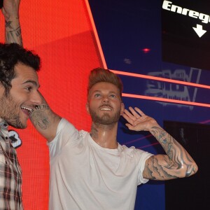 Amir Hadda, la statue de cire de M. Pokora (Matt Pokora) et Nikos Aliagas lors de l'inauguration du tout nouvel espace dédié à l'émission de The Voice, la plus belle voix au musée Grévin à Paris, France, le 7 février 2017. © Veeren/Bestimage
