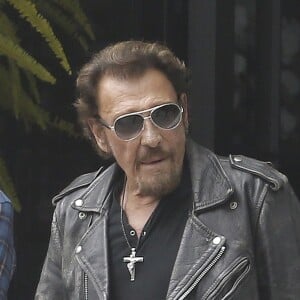 Exclusif - Johnny Hallyday et sa femme Laeticia Hallyday quittent leur propriété de Pacific Palissades le 12 septembre 2016.