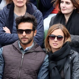 Maxim Nucci (Yodelice) et sa compagne Isabelle Ithurburu dans les tribunes des Internationaux de France de tennis de Roland Garros à Paris. Le 24 mai 2016 © Dominique Jacovides / Bestimage