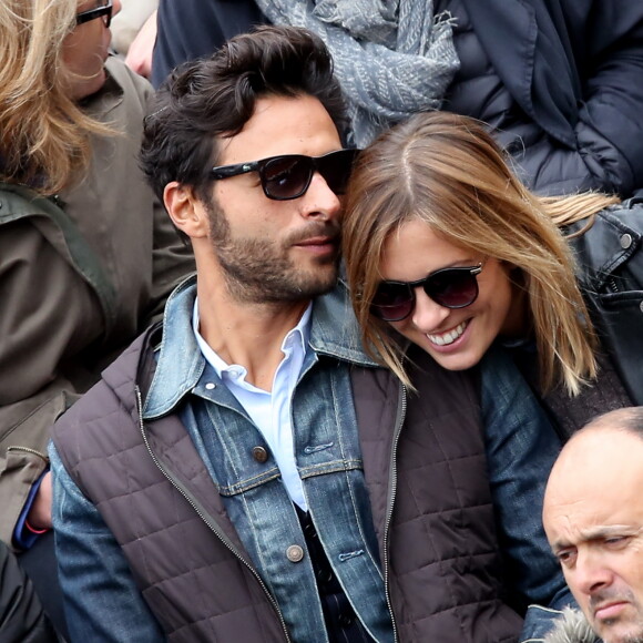 Maxim Nucci (Yodelice) et sa compagne Isabelle Ithurburu dans les tribunes des Internationaux de France de tennis de Roland Garros à Paris. Le 24 mai 2016 © Dominique Jacovides / Bestimage