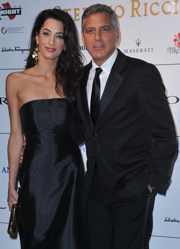 George Clooney et sa fiancée Amal Alamuddin assistent à la soirée "Celebrity Fight Night" à Forte dei Marmi. Le 7 septembre 2014