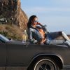 CJ Franco, compagne de Len Wiseman (ex de Kate Beckinsale), pose avec une Buick Riviera de 1968 lors d'un shooting pour la marque 138 Water à Malibu le 16 février 2017.