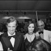 Charles Gérard et Jean-Paul Belmondo avec Laura Antonelli au Festival de Cannes 1974