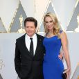 Michael J. Fox et Tracy Pollan sur le tapis rouge des Oscars au Dolby Theater, Los Angeles, le 26 février 2017.