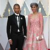 Pharrell Williams et Mimi Valdes sur le tapis rouge des Oscars au Dolby Theater, Los Angeles, le 26 février 2017.