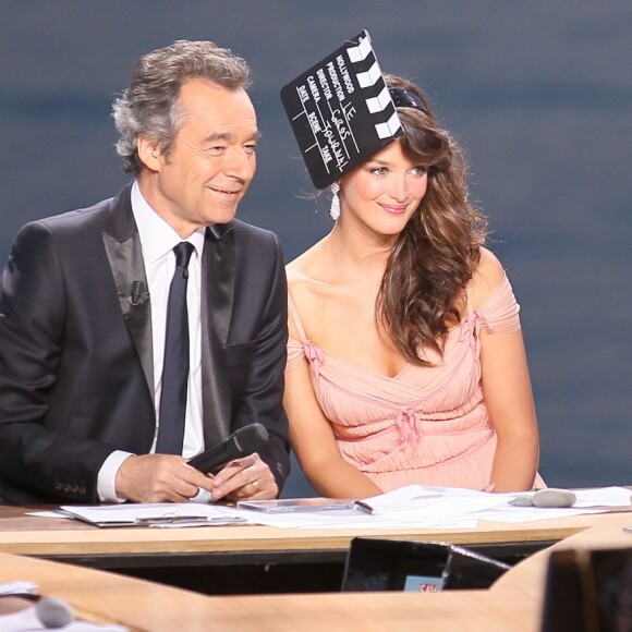 Michel Denisot, Charlotte Le Bon et Lady Gaga sur le plateau du "Grand Journal" de Canal +. 64e festival de Cannes, le 11 mai 2011.