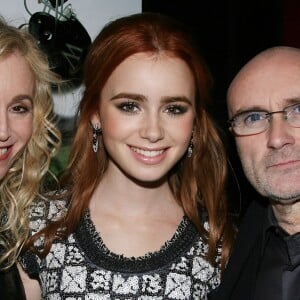 Jill Tavelman, Lily Collins et Phil Collins à la première new-yorkaise du film "The Blind Side" le 17 novembre 2009