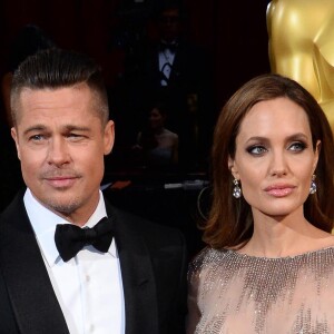 Brad Pitt et Angelina Jolie (habillée en Elie Saab) - 86ème cérémonie des Oscars à Hollywood, le 2 mars 2014