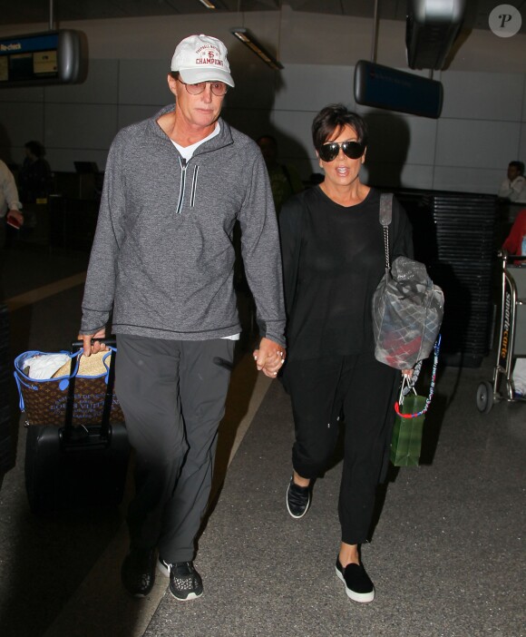 Bruce Jenner et sa femme Kris Jenner arrivent à Los Angeles, en provenance de Thailande le 2 avril 2014.