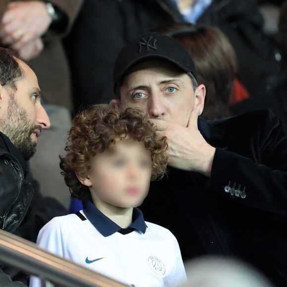 Arié Elmaleh et son fils Isaac, Gad Elmaleh - People assiste au match de Ligue 1 entre le Psg et Lyon à Paris le 19 mars 2017. Le Psg à remporté le match sur le score de 2-1. © Cyril Moreau/Bestimage