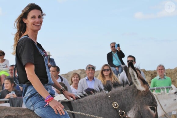 Sophie Thalmann lors de courses d'ânes au profit de l'association ELA sur la plage à Trouville-sur-Mer, le 10 août 2016. © Anne Ceffrey - Théo Duchaussoy/Bestimage