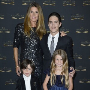 Sophie Thalmann, son mari Christophe Soumillon et leur enfants Charlie et Mika à la 65ème édition des Cravaches d'Or au Théâtre des Champs-Elysées à Paris le 14 mars 2014.