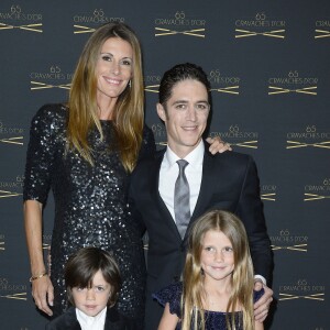 Sophie Thalmann, son mari Christophe Soumillon et leur enfants Charlie et Mika à la 65ème édition des Cravaches d'Or au Théâtre des Champs-Elysées à Paris le 14 mars 2014. D