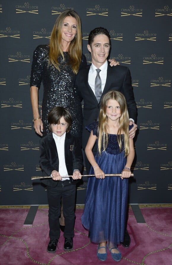 Sophie Thalmann, son mari Christophe Soumillon et leur enfants Charlie et Mika à la 65ème édition des Cravaches d'Or au Théâtre des Champs-Elysées à Paris le 14 mars 2014. D