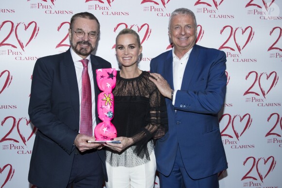 Exclusif - Laeticia Hallyday ("Femme de Coeur 2017" par Clarins pour son engagement humanitaire), Christian Courtin-Clarins (président du conseil de surveillance de Clarins) et Dr Olivier Courtin-Clarins (président du directoire de Clarins) - Le Prix Clarins pour l'enfance fête ses 20 ans et récompense sa nouvelle femme de coeur L.Hallyday pour son association La Bonne Étoile à l'hôtel Salomon de Rothschild à Paris, France, le 14 mars 2017. © Borde-Jacovides/Bestimage