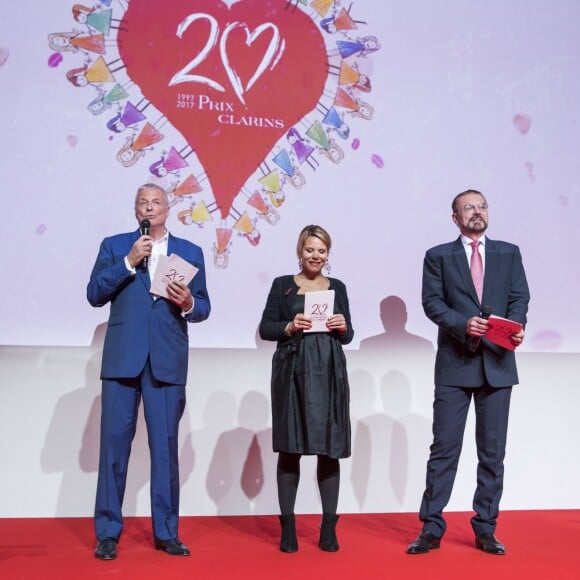 Exclusif - Christian Courtin-Clarins (président du conseil de surveillance de Clarins), guest et Dr Olivier Courtin-Clarins (président du directoire de Clarins) - Le Prix Clarins pour l'enfance fête ses 20 ans et récompense sa nouvelle femme de coeur L.Hallyday pour son association La Bonne Étoile à l'hôtel Salomon de Rothschild à Paris, France, le 14 mars 2017. © Borde-Jacovides/Bestimage