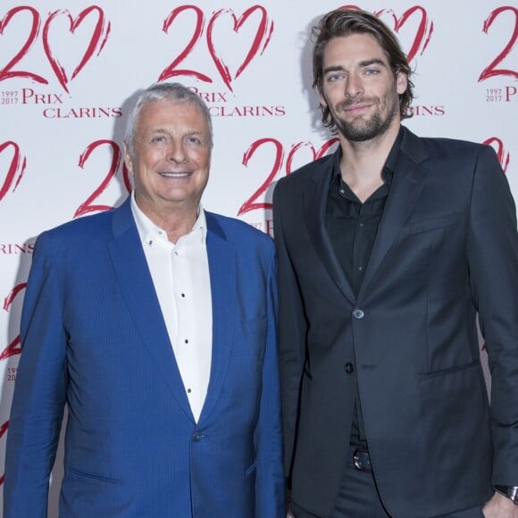 Exclusif - Christian Courtin-Clarins (président du conseil de surveillance de Clarins) et Camille Lacourt - Le Prix Clarins pour l'enfance fête ses 20 ans et récompense sa nouvelle femme de coeur L.Hallyday pour son association La Bonne Étoile à l'hôtel Salomon de Rothschild à Paris, France, le 14 mars 2017. © Borde-Jacovides/Bestimage