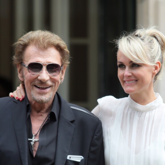 Johnny Hallyday et sa femme Laeticia - Sorties du défilé de mode Haute-Couture automne-hiver 2016/2017 "Christian Dior" à Paris. Le 4 juillet 2016 © CVS-Veeren / Bestimage