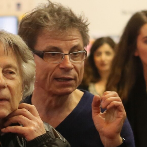 Exclusif - Roman Polanski tourne une scène de son prochain film, dans lequel joue son épouse E. Seigner, pendant le 37e Salon du Livre à la Porte de Versailles à Paris, le 24 mars 2017. © CVS/Bestimage