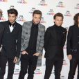 Le groupe One Direction (Niall Horan, Zayn Malik, Liam Payne, Louis Tomlinson, Harry Styles) à la Soirée des "BBC Music Awards" à Londres, le 11 décembre 2014.