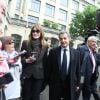 Nicolas Sarkozy et sa femme Carla Bruni-Sarkozy ont voté pour le second tour de l'élection présidentielle au lycée La Fontaine à Paris le 7 mai 2017.