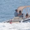 Kourtney Kardashian et son compagnon Younes Bendjima quittent l'hôtel du Cap Eden Roc en bateau lors du 70ème Festival International du Film de Cannes le 24 mai 2017.